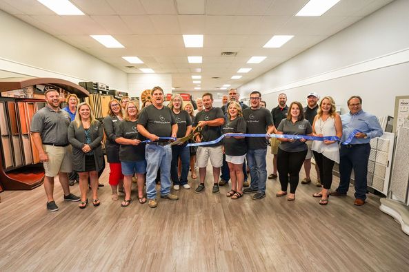 Flooring By Michael Cuts Ribbon on New Store